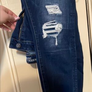 Distressed Blue Denim Jeans